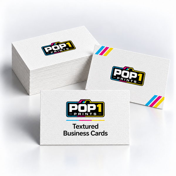 White textured business cards with POP 1 Prints branding, shown in a stack with upright front and back examples.